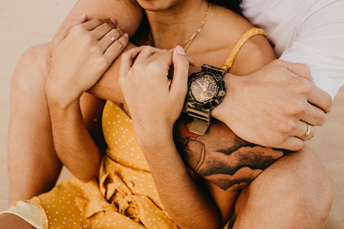 Man embracing woman in gentle hug