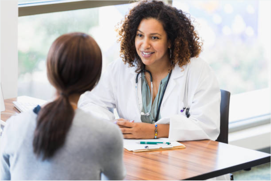 woman talking to a female doctor